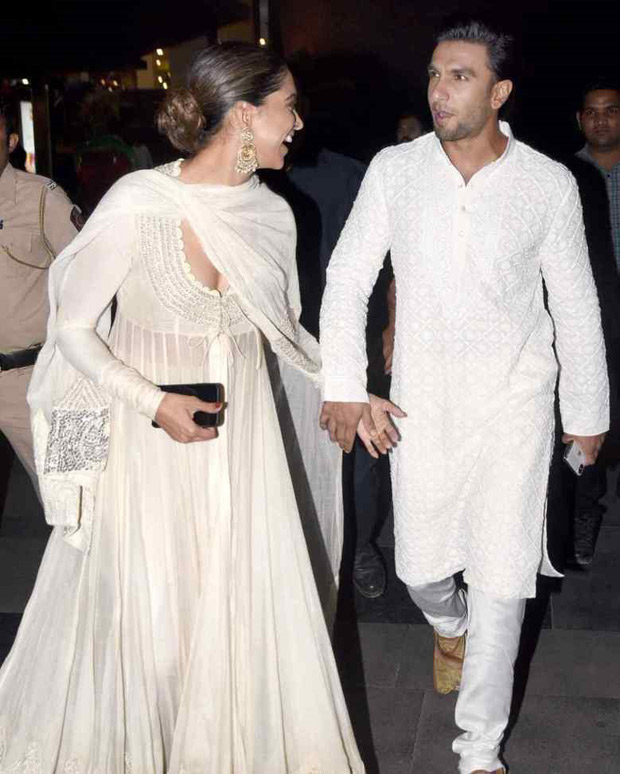 love is in the air as deepika padukone and ranveer singh walk hand in hand and twin in white for the padmaavat screening!