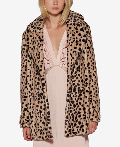 the triumphant return of the leopard print coat