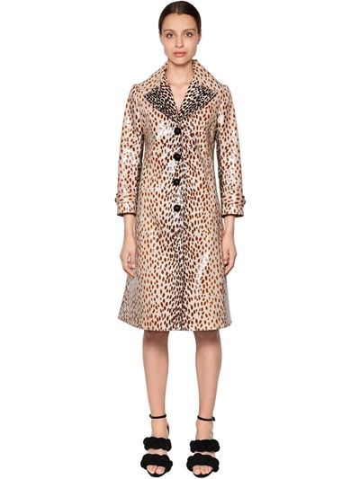 the triumphant return of the leopard print coat