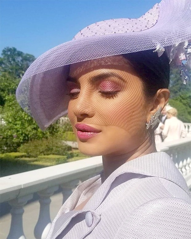 Can’t keep calm! Priyanka Chopra is at the royal wedding and she looks drop dead amazing in Vivienne Westwood!