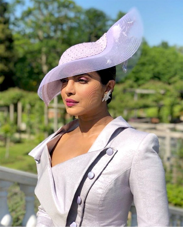 Can’t keep calm! Priyanka Chopra is at the royal wedding and she looks drop dead amazing in Vivienne Westwood!