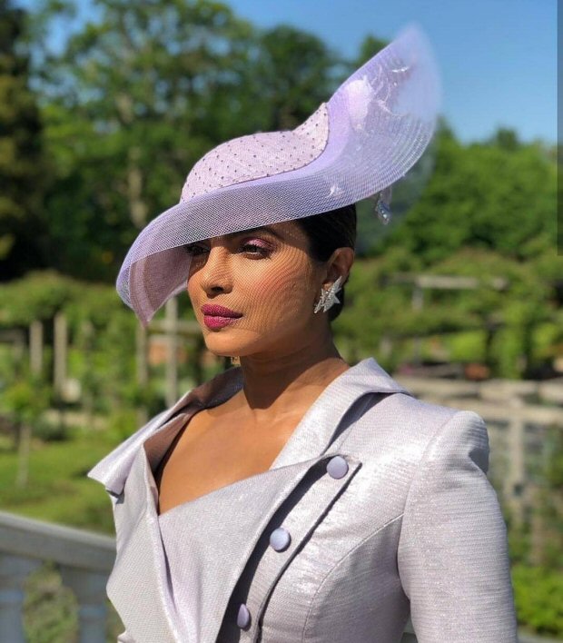 ROYAL WEDDING: Priyanka Chopra arrives in style at the Prince Harry – Meghan Markle Wedding