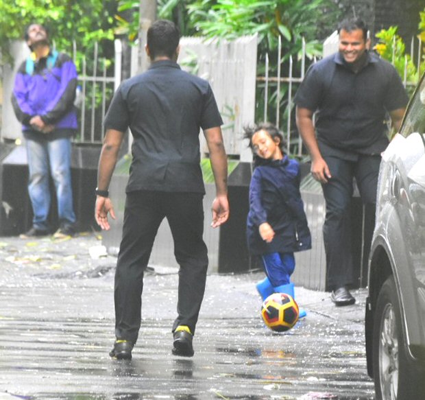 Aamir Khan’s son Azad enjoys a RARE outing in rain, plays some football on the streets of Mumbai (see pics)