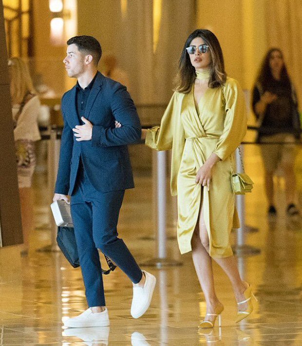 Did Priyanka Chopra just CONFIRM her relationship with Nick Jonas by being his official date at his cousin's wedding?