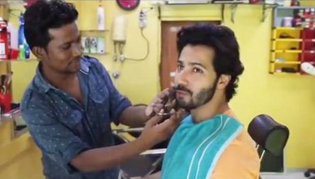 varun dhawan goes to a local barber to get his sui dhaaga moustached look