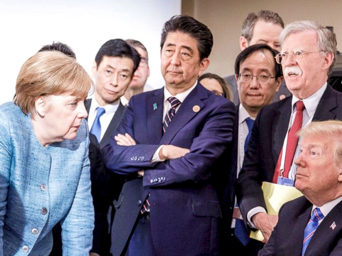 what happened in this iconic photo of angela merkel & donald trump?