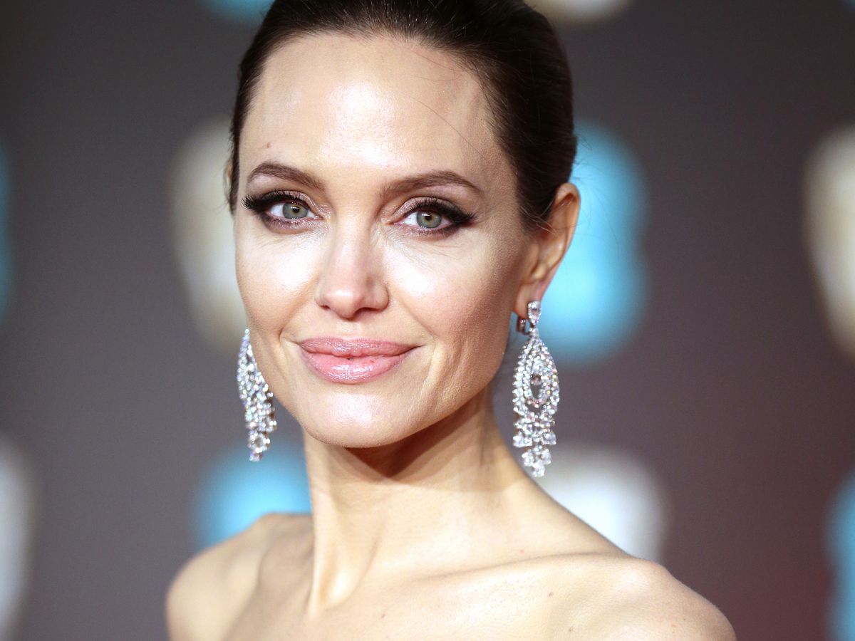 angelina jolie’s best beauty looks, from ’90s goth to modern icon