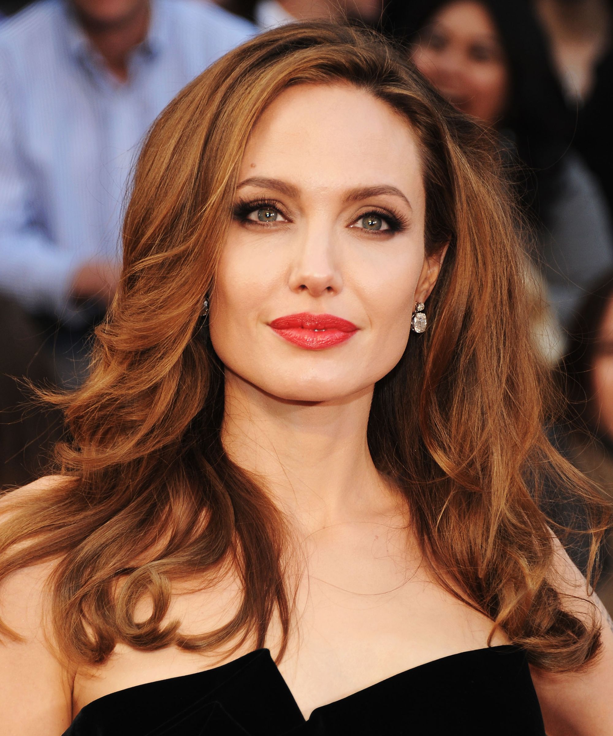 angelina jolie’s best beauty looks, from ’90s goth to modern icon