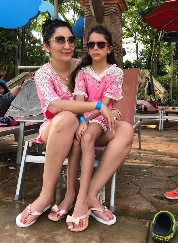 maanayata dutt is chilling and relaxing in a pool with kids iqra and shahraan