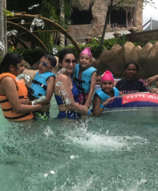 maanayata dutt is chilling and relaxing in a pool with kids iqra and shahraan
