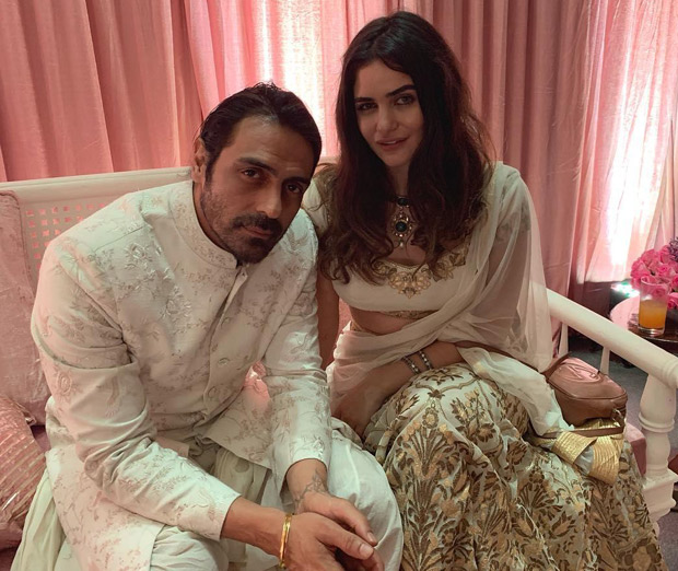 Arjun Rampal twins in white with rumoured girlfriend Gabriella Demetriades at a wedding