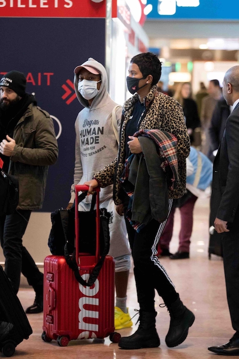 here comes pharrell williams with that face-mask again!