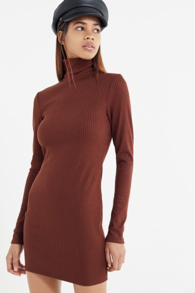23 turtleneck dresses that strike the perfect balance between cute & cozy