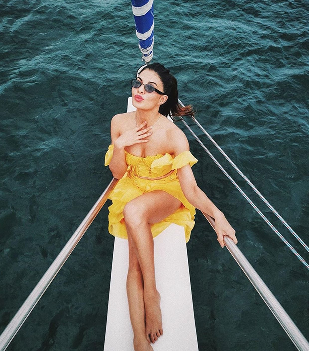 Jacqueline Fernandez stuns in a yellow off-shoulder dress during her birthday trip on a yacht in Sri Lanka