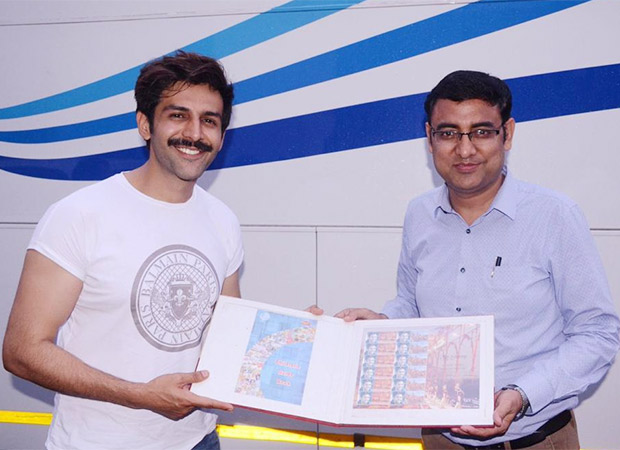 Kartik Aaryan is all smiles as he receives a customised stamp collection from Lucknow GPO!