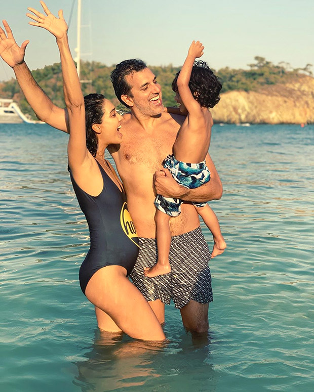 PARTY OF FOUR! Lisa Haydon announces her second pregnancy with an adorable photo with husband and son