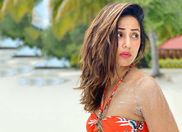 Hina Khan flaunts her perfect body in an orange BIKINI by the beach in Maldives