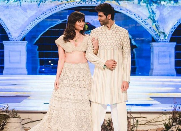 Kareena Kapoor Khan and Kartik Aaryan look like a sight for sore eyes in white as they walk the ramp for Manish Malhotra