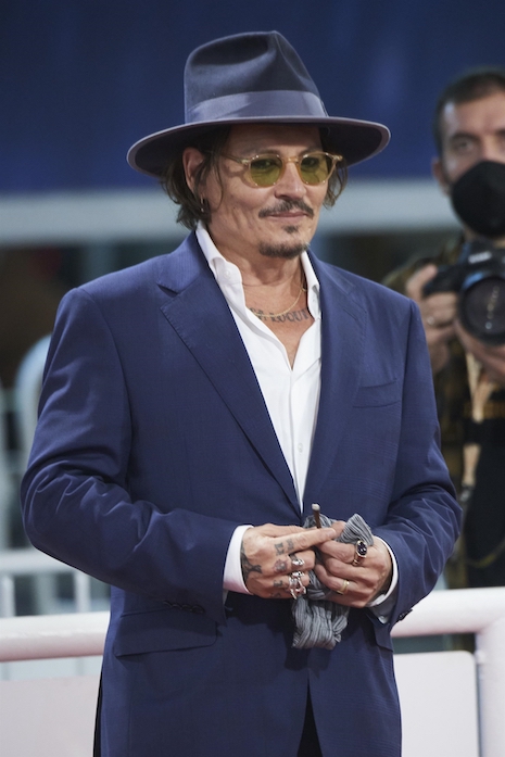 johnny depp supports his errant friends