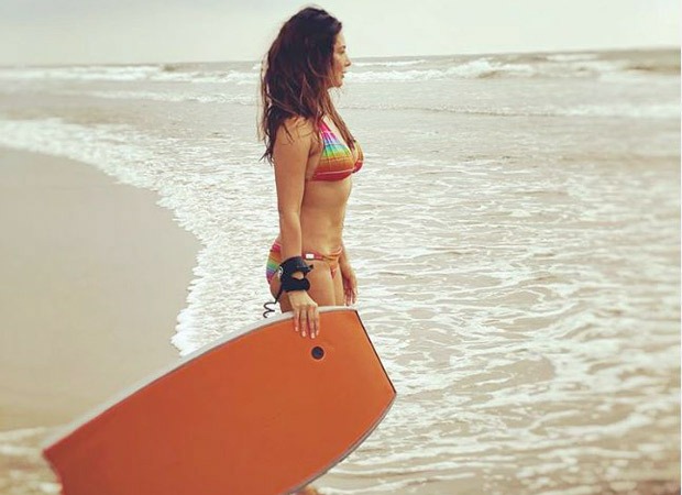 Kim Sharma shares bikini photo remembering her beach days; gets trolled by Yuvraj Singh 