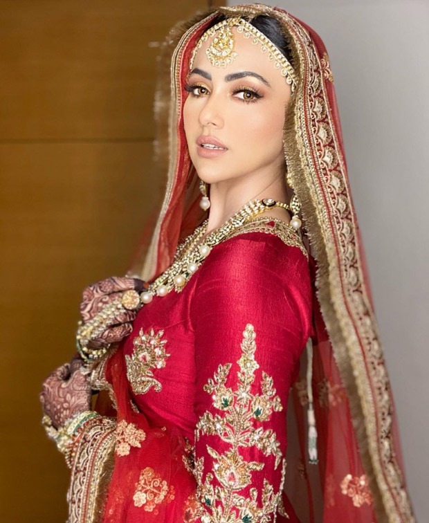 Sana Khan’s looks ethereally royal in a classic red lehenga for her Walima with Mufti Anas