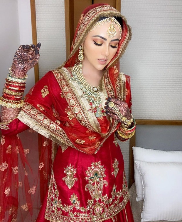 Sana Khan’s looks ethereally royal in a classic red lehenga for her Walima with Mufti Anas