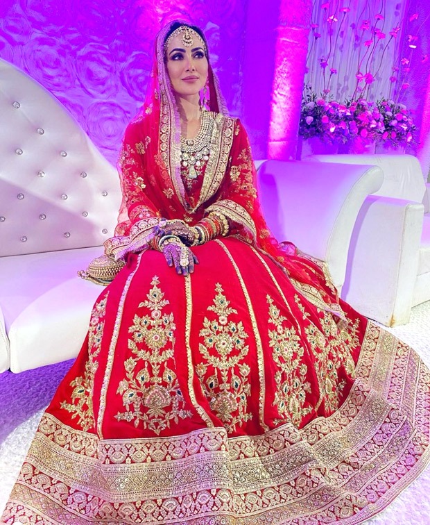Sana Khan’s looks ethereally royal in a classic red lehenga for her Walima with Mufti Anas