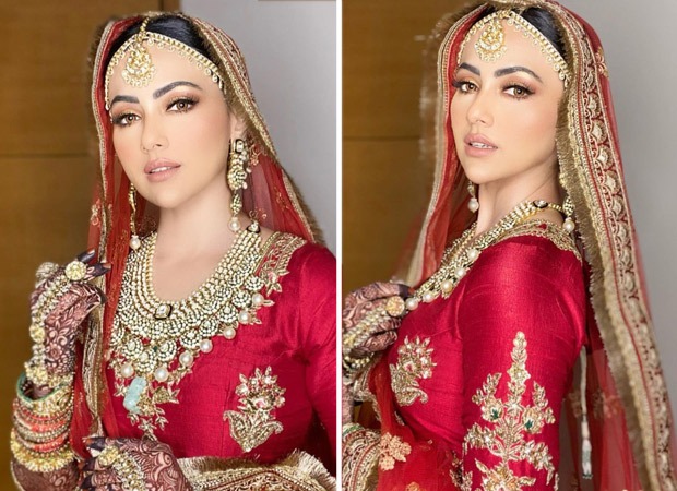 Sana Khan looks ethereally royal in a classic red lehenga for her Walima with Mufti Anas