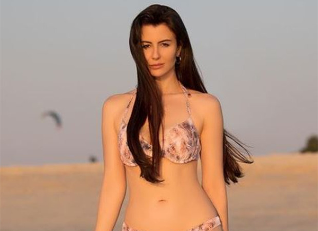 Giorgia Andriani turns up the heat as she poses in a pastel bikini
