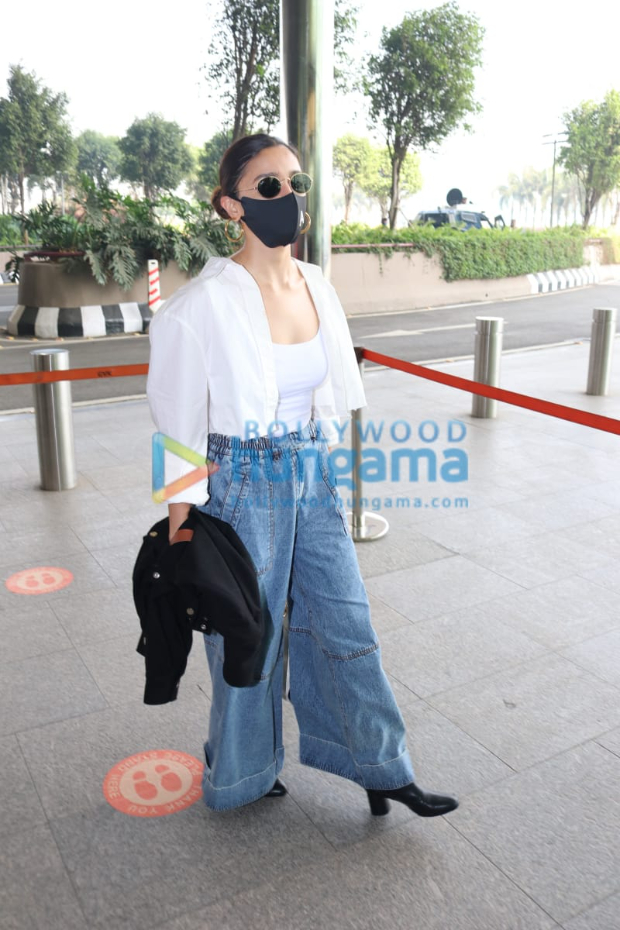 alia bhatt makes a statement in classic baggy denims and white combination while carrying expensive gucci tote bag worth rs. 1.96 lakhs