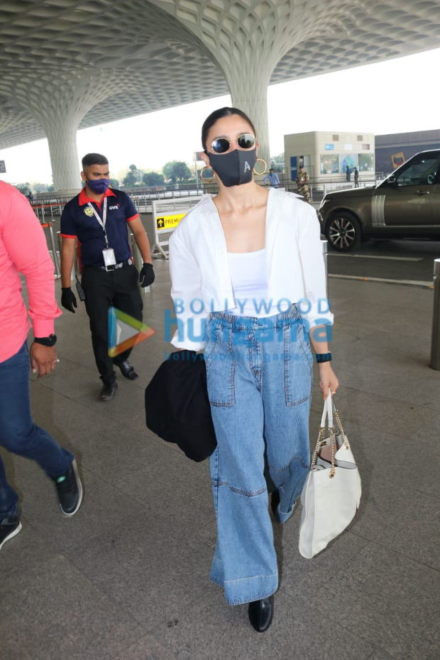 alia bhatt makes a statement in classic baggy denims and white combination while carrying expensive gucci tote bag worth rs. 1.96 lakhs