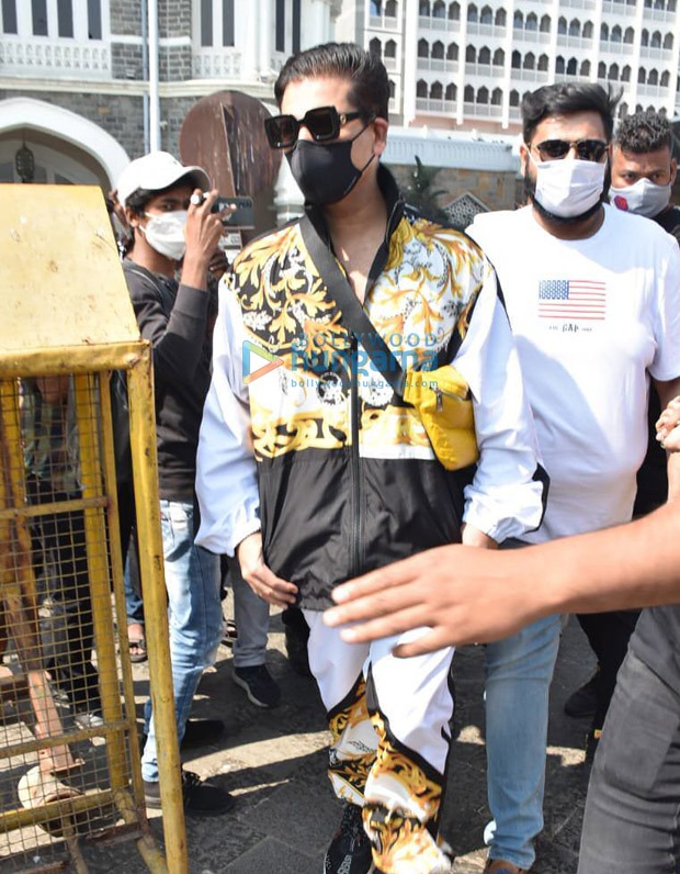 karan johar spotted at gateway of india, leaving for varun dhawan-natasha dalal’s wedding