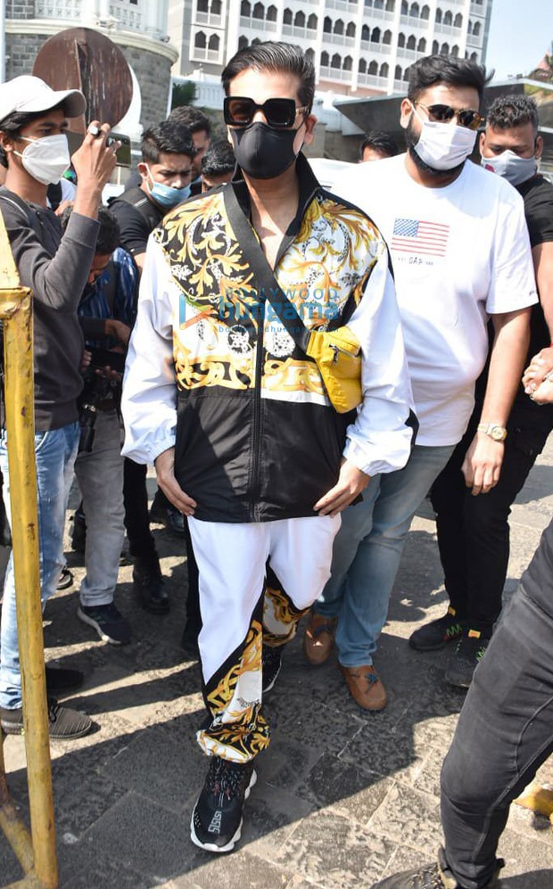 karan johar spotted at gateway of india, leaving for varun dhawan-natasha dalal’s wedding