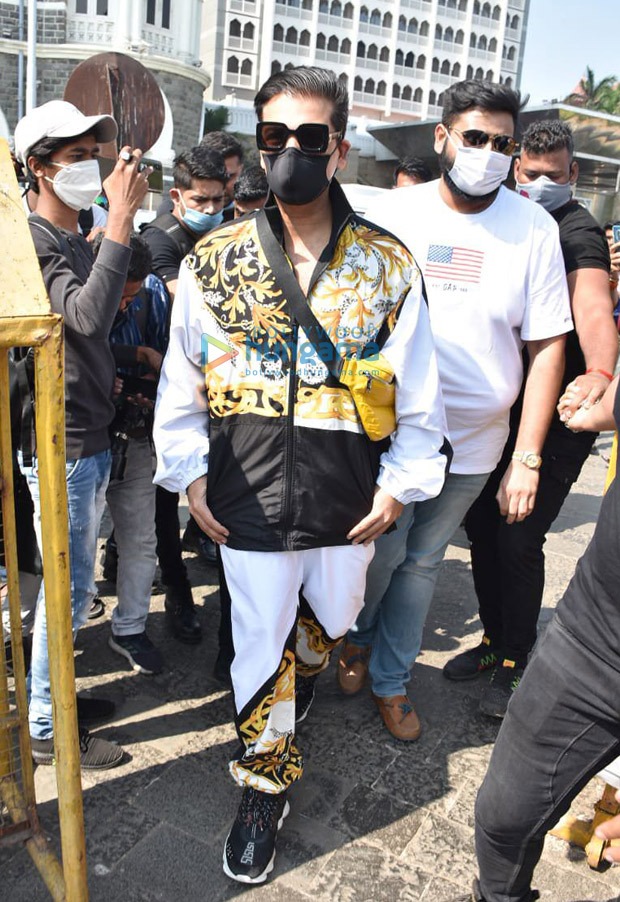 karan johar spotted at gateway of india, leaving for varun dhawan-natasha dalal’s wedding