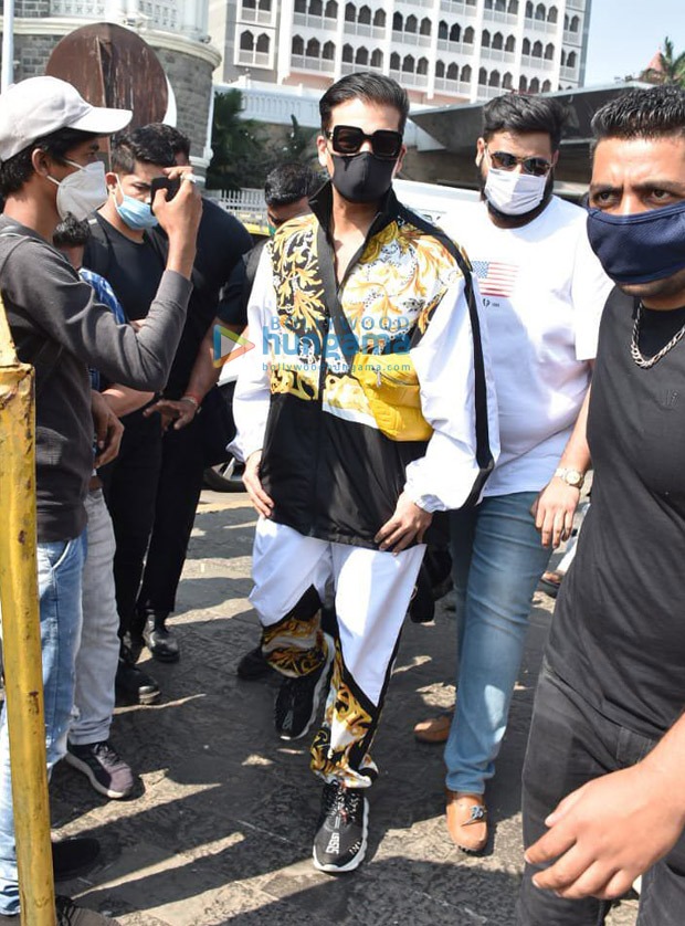 karan johar spotted at gateway of india, leaving for varun dhawan-natasha dalal’s wedding