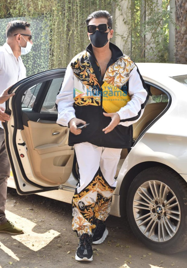 karan johar spotted at gateway of india, leaving for varun dhawan-natasha dalal’s wedding