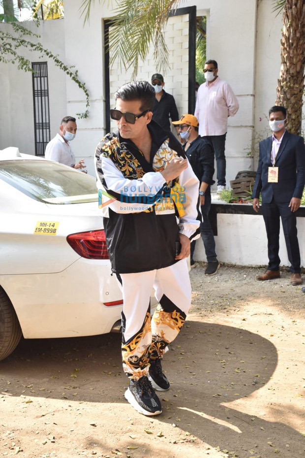 karan johar spotted at gateway of india, leaving for varun dhawan-natasha dalal’s wedding