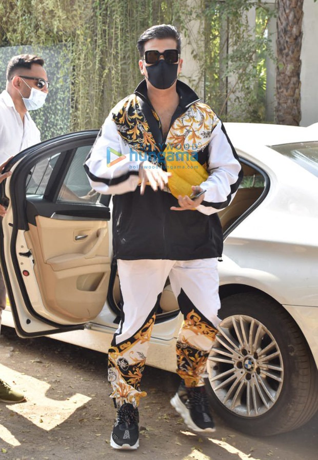 karan johar spotted at gateway of india, leaving for varun dhawan-natasha dalal’s wedding