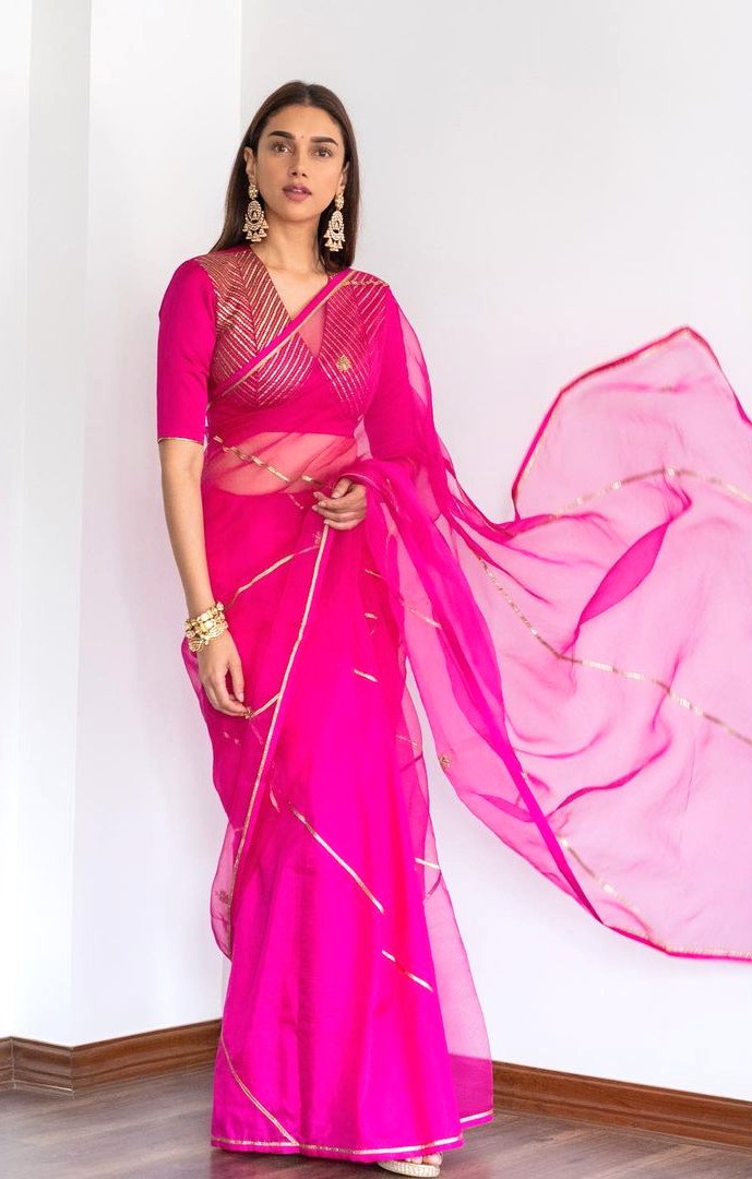 aditi rao hydari looked resplendent in raw mango sheer and vibrant pink saree at dia mirza’s wedding