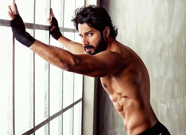 HAWT! Varun Dhawan flaunts his chiseled abs with an intense expression as he poses shirtless