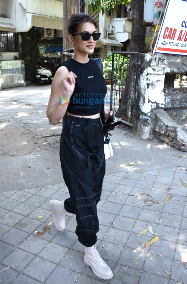 Kriti Sanon keeps it casual in crop top and cargo pants, carries Balmain Paris bag worth Rs. 1.5 lakhs 