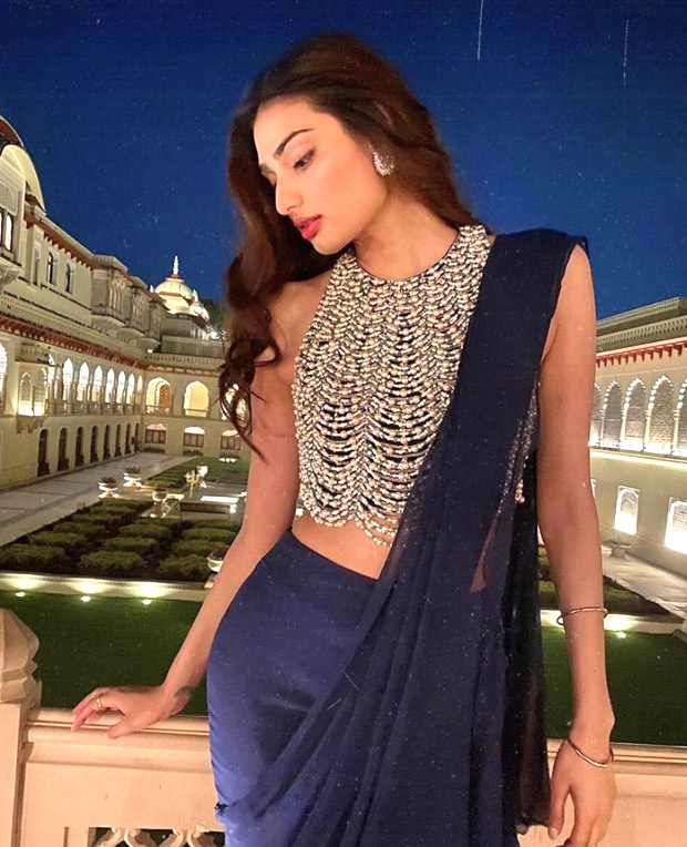 athiya shetty pairs pearl embellished blouse with navy draped chiffon saree worth rs. 78,800