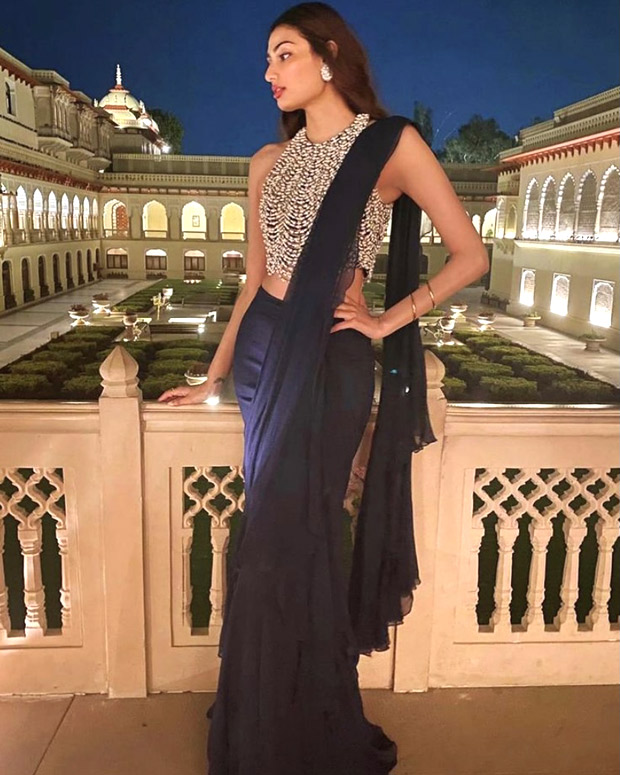 athiya shetty pairs pearl embellished blouse with navy draped chiffon saree worth rs. 78,800