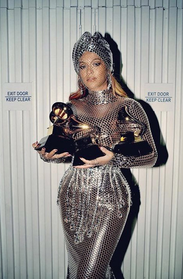 beyoncé stuns in silver metal mesh gown by burberry’s riccardo tisci after making history at grammys 2021