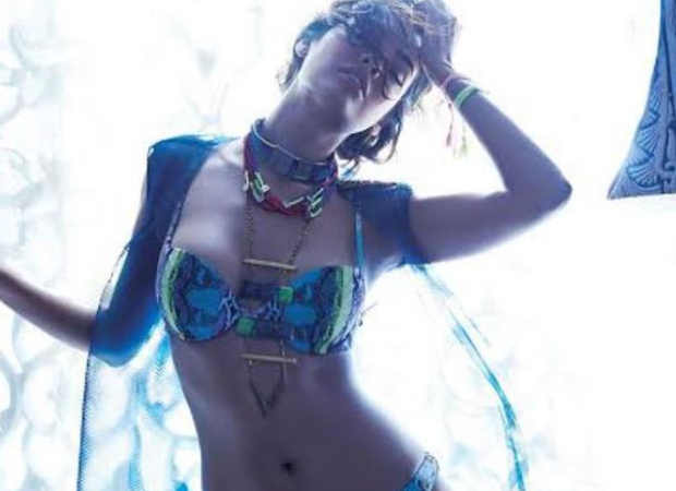 Esha Gupta looks smoking hot as she poses in a blue and green two piece bikini