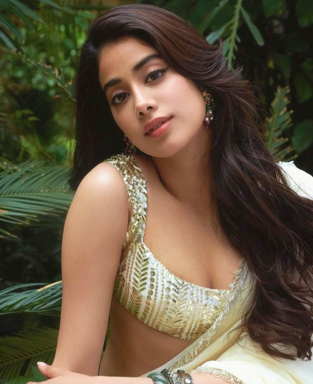 janhvi kapoor looks alluring in sexy sequinned blouse and ivory chiffon saree during roohi promotions