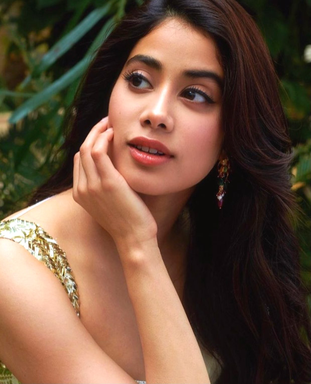 janhvi kapoor looks alluring in sexy sequinned blouse and ivory chiffon saree during roohi promotions