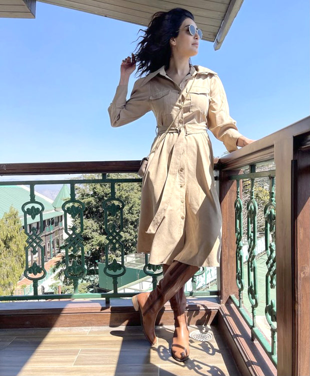 Karishma Tanna opts for affordable trench dress and pairs it with knee high boots