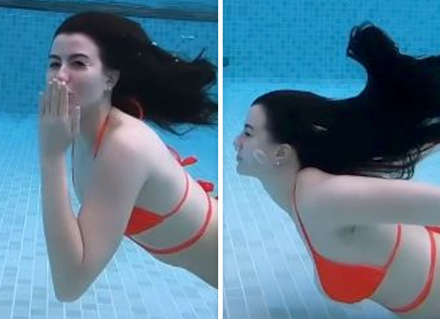 Giorgia Andriani shares a video of herself swimming underwater in a red bikini