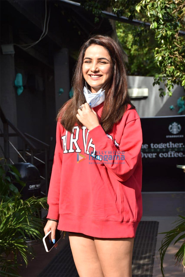 Jasmin Bhasin looks adorable in oversized red sweatshirt and sneakers